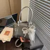 Bolso de Mano de Marca Extranjera de Alta Gama para Mujer, Nuevo Bolso de Hombro Sencillo de Moda Verano 2026, Bolso Cruzado de Nicho para Commuter