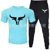 T-shirt Masculina de Manga Curta e Calça Suit Casual Venda Quente Transfronteiriça Gola Redonda Cor Lisa Roupa Esportiva Casual com Estampas e Impressão