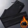 Nuevos pantalones deportivos gruesos de pana para otoño e invierno, cintura elástica, corte recto holgado, pantalones casuales forrados de felpa para hombre