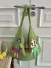 Bolso tejido de un solo hombro nuevo para viajes de verano, de mano, bolso tejido popular para mujer, moderno bolso de malla tejida de paja para playa, elegante