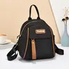 Mochila de moda para mujer 2023 nuevo estilo coreano estilo ins moderna casual estilo occidental impermeable tela Oxford mochila para mujer