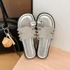 Pantuflas de exterior para mujer estilo étnico 2026 nuevo modelo de verano sandalias romanas con tiras cruzadas y pedrería, planas y antideslizantes