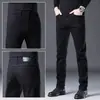 Hong Kong 2026 Novos Jeans Preto-Cinza Masculino Verão Ajuste Fino Perna Reta Elástico Casual Versátil Calça Longa