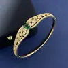 Pulsera de cristal de esmeralda individual con incrustaciones de diamantes y diseño hueco estilo palacio y pulsera de moda con incrustaciones de diamantes de flor de fritillaria blanca