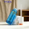 Botella de vidrio redonda recta escalonada azul transparente de 30 ml para aceites esenciales en stock, botella dispensadora cosmética con gotero de presión transparente para sérum