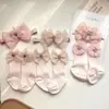 2026 Nuevo Producto Diadema con Flor de Lazo Estilo Coreano Color Sólido Algodón Calcetines de Media Pantorrilla Juego Combinado de Accesorios para el Cabello para Niños