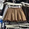 Falda Corta Floral Blanca para Mujer, Otoño e Invierno 2025 Nueva Petite Anti-Exposición Línea A Farol Acampanada Media Falda Ins