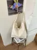 Bolsa de mano transfronteriza de gran capacidad para mujer, nuevo bolso de hombro vintage de alta gama para el día a día, bolso simple y versátil para el antebrazo para mujer