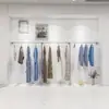 Estante de exhibición para tienda de ropa pared alambre de acero inoxidable trefilado estante de exhibición colgante lateral para tienda de ropa de mujer estante colgador de pared