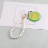 Corrente de mão de vidro com laço duplo de pérola alongado estilo coreano corrente para celular feita à mão DIY corrente para pendurar boneca de pelúcia acessórios
