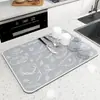 Venta al por mayor de fábrica tapete de drenaje mesa de lavado de cocina mesa de comedor mesa de bar tapete de mesa absorbente resistente al desgaste antideslizante lodo de diatomeas se puede usar para cabello