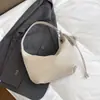 Bolso tejido de patrón vintage, bolso de axila casual de alta estética, nuevo modelo de verano 2026, bolso cruzado de color liso estilo coreano de nicho