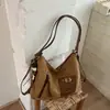 Bolsa casual de camurça 2026 novo modelo mochila de grande capacidade para trabalho e deslocamento, bolsa de ombro única, moderna