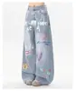 Calça Jeans Feminina YK Fun com Estampa Graffiti, Casual Dopamina Versátil Emagrecedora Hip-Hop Doce Menina Calça Afunilada Emagrecedora