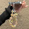 Cadena para teléfono móvil con cuentas de estrella llavero lazo colgante para funda de teléfono móvil adornos cadena de mano para bolso de niña venta al por mayor