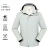 Chamarra rompevientos tres en uno con impresión de logo personalizado, adecuada para otoño e invierno, con forro interior desmontable, diseñada como ropa de trabajo corporativa y disponible en tallas para mujer.