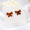 Pendientes de plata S925 con forma de lazo simple, estilo retro de Corea del Sur, de resina y ámbar, con personalidad para niña, B543