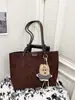 Bolso Cubo Portátil de Contraste de Color Retro Francés Transfronterizo Nuevo para Mujer Otoño e Invierno Versátil para el Trabajo y los Viajes Bolso Cruzado