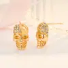 Pendientes retro con cabeza de calavera y diamantes, pendientes de Halloween de hueso premium transfronterizo, pendientes con cabeza de fantasma de ojo grande y cabeza con ruedas