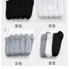 Venta al por mayor de fábrica calcetines de barco calcetines para hombre calcetines para niños de boca baja invisibles color liso negro blanco gris calcetines deportivos primavera verano otoño