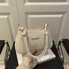 Bolsos populares de estampado de leopardo para mujer de este año 2026 nuevos bolsos de moda para el hombro para mujer bolsos de hombro versátiles retro