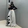 Conjunto de Ropa de Moda para Niñas Mayores, Estilo Coreano Primavera y Otoño, Chaleco Fresco de un Hombro y Pantalones de Pierna Ancha, Conjunto de Dos Piezas a la Moda para Niñas