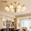 Araña de salón vintage de estilo francés en color nogal retro, de alta gama y elegante, con cristal de frijol mágico en forma de caqui para protección ocular