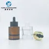 En stock 15 ml30ml50ml hombro plano fondo grueso redondo recto botella de esencia anillo de cabeza grande gotero de vidrio botella de aceite esencial material de embalaje