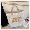Comércio Exterior Atacado 2026 Nova Bolsa de Palha Moda Feminina Grande Capacidade Ombro Único Elegante Carta Transversal Bolsa Tote