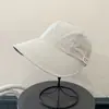 Sombrero de Pescador Parcheado a Rayas Nuevo Coreano para Mujer, Estilo Delgado de Verano, Ala Ancha para Sombrear el Sol, Adelgazante de Rostro, Protección Solar, Sombrero de Moda