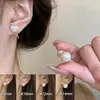Pendientes de Clip de Lujo Ligero Estilo Hong Kong sin Agujeros para Orejas Pendientes Geométricos de Perla y Camelia para Mujer Sentido Avanzado Simples Elegantes Pendientes Versátiles