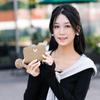 Cartera de mujer con borla de pelo y cremallera versión coreana de todo-partido simple acolchada con costura decorativa de mariposa cartera corta al por mayor