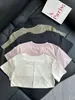 [En Stock] Fila Algodón Orgánico Puro Tela Lisa Versátil para Mujer Cuello Redondo Casual Versátil Mangas Cortas