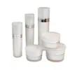 Juego de botellas redondas cónicas de acrílico, botellas de lujo para crema facial y loción, botellas de packaging cosmético vacías, venta al por mayor de materiales de packaging
