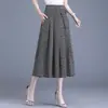 Falda Plisada Floral Versátil de Moda y Elegante 2026 Nuevo Estilo de Verano Elegante que Reduce la Edad de Cintura Alta Falda de Paraguas Línea A