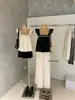 Wgwe8834 Ropa de Mujer Shisanxing de Guangzhou Primavera/Verano Nuevo Top Babydoll de Tirantes con Cuello Cuadrado y Adorno de Encaje