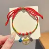 Pulsera de Hilo Rojo de Bebé de Dibujos Animados 2026 Nuevo Estilo Bendición Pequeño Zongzi Pulsera Estilo Chino Festival del Bote del Dragón Hilo de Cinco Colores Ajustable Venta al por Mayor