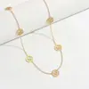 Conjunto de pulseira, colar e brincos de aço titânio com letras vazadas G G transfronteiriço para mulheres, simples, moderno, versátil e com cores duradouras