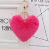 Llavero colgante de pompón de corazón multicolor, adorno colgante para coche, pequeño corazón de durazno de felpa con estampado de leopardo, accesorios de joyería al por mayor