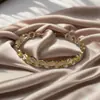 Pulseira Aberta Tendência Europeia e Americana Elegante em Aço Inoxidável com Coração Vazado Criativa Simples em Formato de C Coração de Pêssego para Mulheres