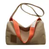 Bolsa vintage de grande capacidade para mulheres, novo modelo 2025, bolsa tote simples de lona para estudantes, bolsa de ombro e transversal para mulheres