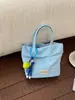 Bolso de mano de lunares con flecos estilo coreano para mujer, nuevo y versátil bolso de hombro, bolso cruzado y bolso para teléfono 2026