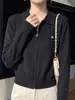 Cardigan Feminino Andy de Veludo com Gola Polo, liso e macio, resistente a bolinhas, adequado para usar na primavera e no outono, e pode ser usado em camadas no outono e inverno.