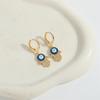 Europa y Estados Unidos nuevo color dopamina gota aceite ojos oreja hebilla moda retro diablo ojo personalidad pendientes joyería mujeres