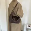 Nuevo estilo otoño/invierno, bolso cruzado casual y versátil, bolso con forma de dumpling, nueva colección 2026, gran capacidad, nuevo bolso de un solo hombro