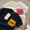Camiseta de Manga Corta de Verano para Niños y Niñas, Elegante Tendencia Infantil Estilo Coreano Bloque de Color Bolsillo Letra Manga Media Top