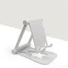 Soporte Plegable para Teléfono Móvil de Escritorio Portátil Simple para Tableta Soporte Creativo Pequeño Regalo Soporte para Teléfono Móvil Soporte de Soporte Venta al por Mayor