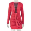 Estilo europeo y americano Ins temperamento sexy ropa de mujer ajustada color liso falda corta ajustada a la cadera cintura fina cuello en V manga larga vestido asimétrico