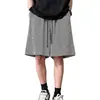 Pantalones cortos de punto a rayas holgados de pierna ancha para hombre, shorts deportivos casuales de verano en blanco y negro, pantalones de longitud media versátiles de alta gama
