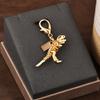 Colgante para llave de coche, bolso de gran sentido, accesorios de color dorado, oso, cereza, trébol de cuatro hojas, mariposa, bolso escolar, joyería al por mayor